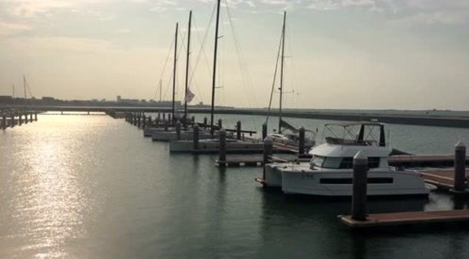 夕阳、大海、游艇与码头！一起探秘海南的国家帆船基地码头吧！