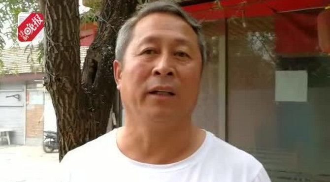 北京玉泉山附近一修车厂露天喷漆被举报  上午接报下午拆除